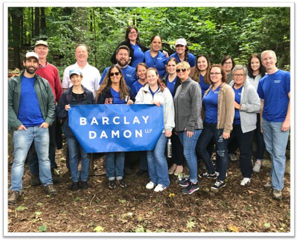 The Rochester office annual Community Day took place at Washington Grove, with attorneys and staff helping with trail maintenance and removing invasive species such as lily of the valley, honeysuckle, and Norway maples.